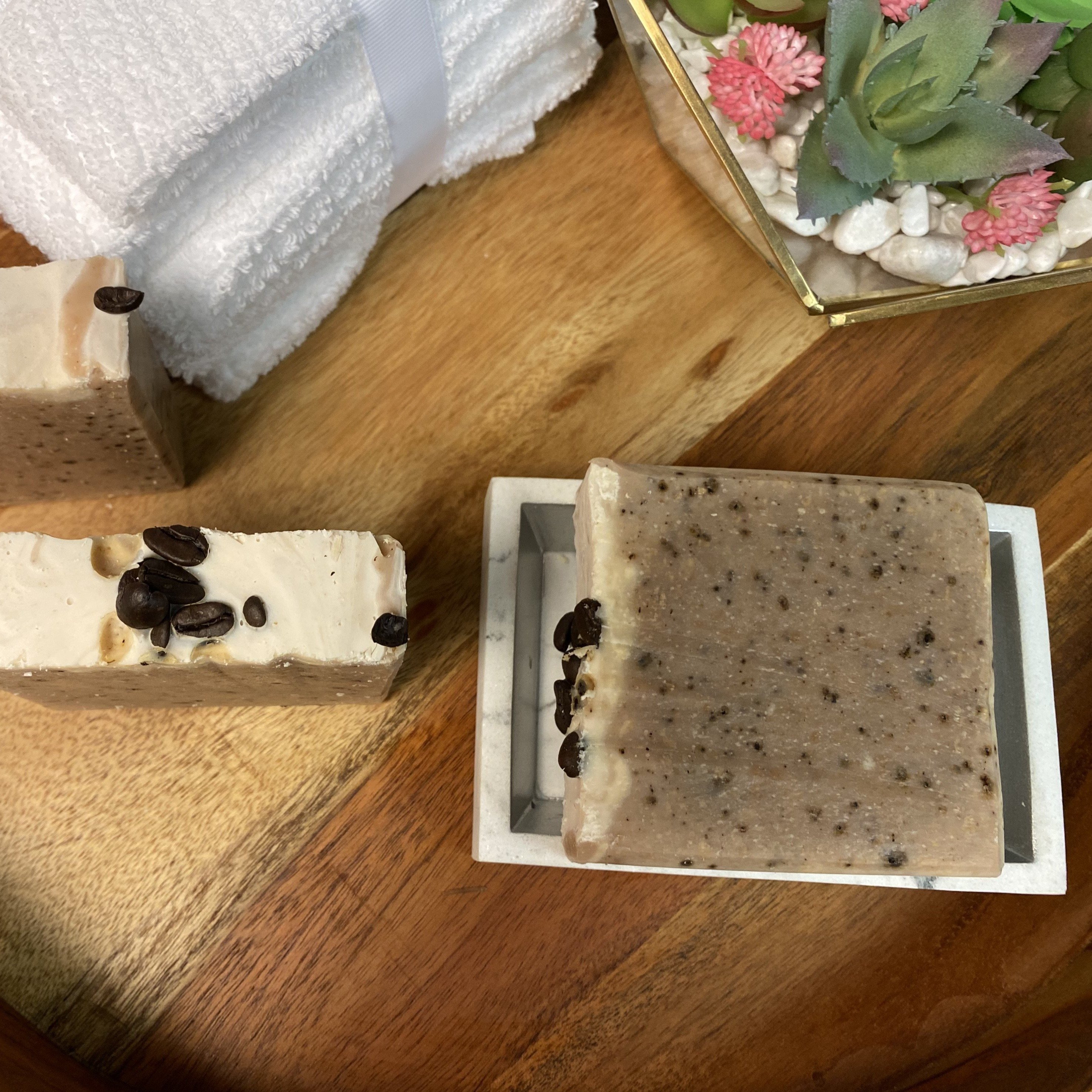 Large Goats Milk Coffee Scrub Soap bar with coffee grounds and oatmeal, showcasing its creamy texture and caramel color.