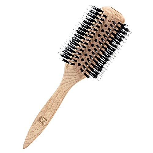 Marlies Möller Large Round Styling Brush with ergonomic handle and smooth bristles for styling hair.