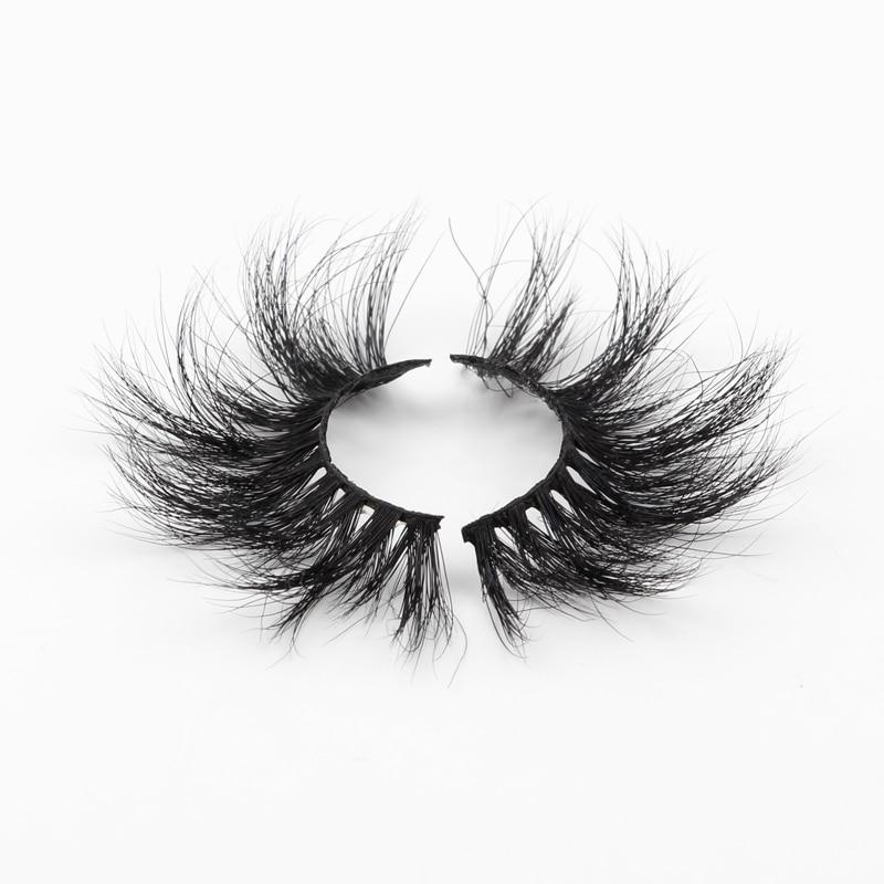 A set of Lashes Mink 25mm dramatic false eyelashes displayed in elegant packaging, showcasing their fluffy and voluminous design.