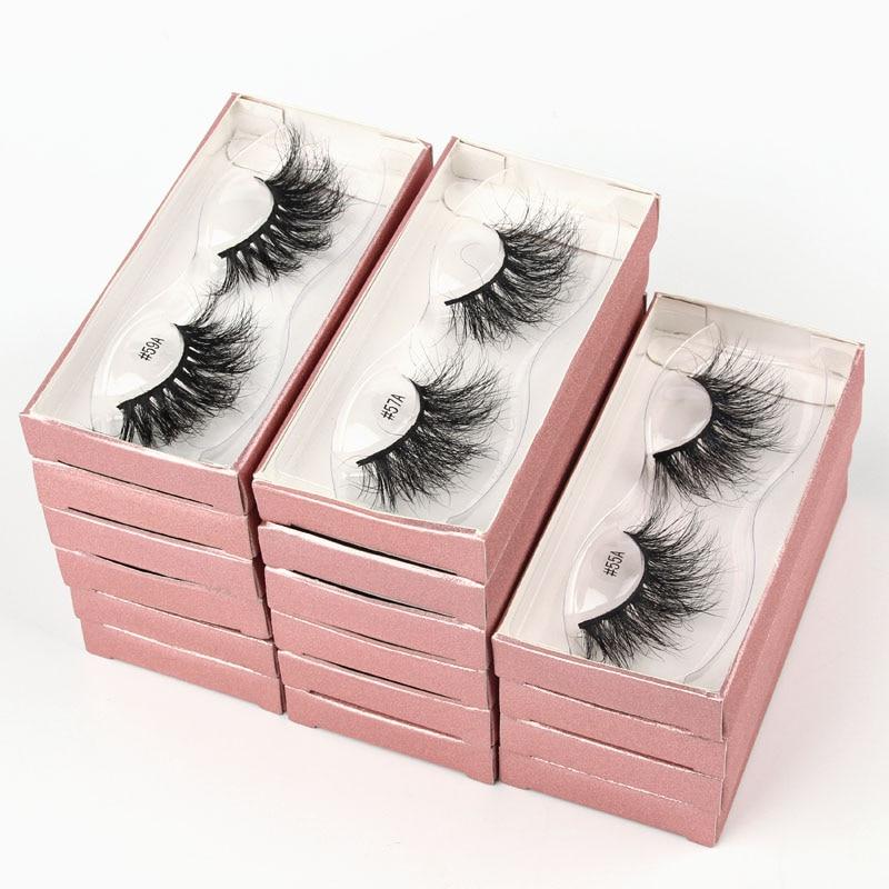 A set of Lashes Mink 25mm dramatic false eyelashes displayed in elegant packaging, showcasing their fluffy and voluminous design.