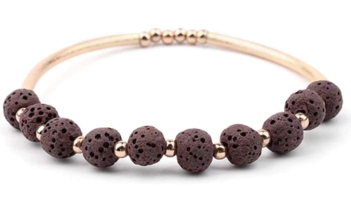 Lava Stone Essential Oil Bracelet featuring brown lava stones and gold accents, perfect for aromatherapy.