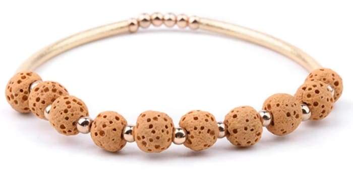 Yellow Lava Stone Essential Oil Bracelet with gold accents, showcasing its natural stones and stylish design.