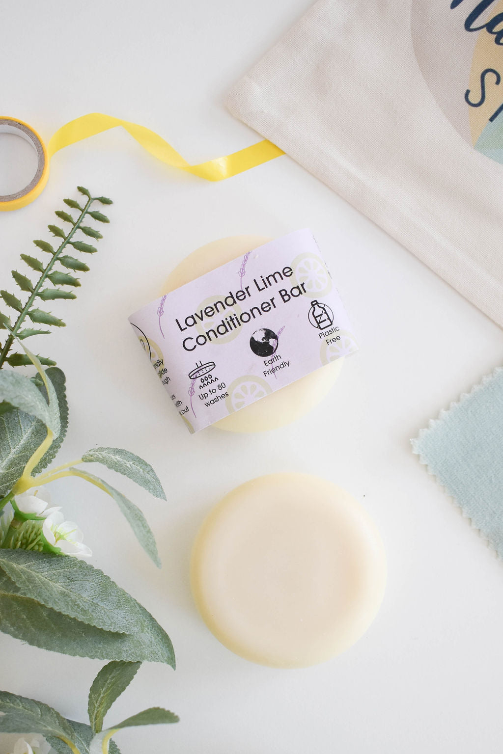 Lavender and Lime Solid Conditioner bar, eco-friendly and plastic-free, showcasing its unique design and natural ingredients.