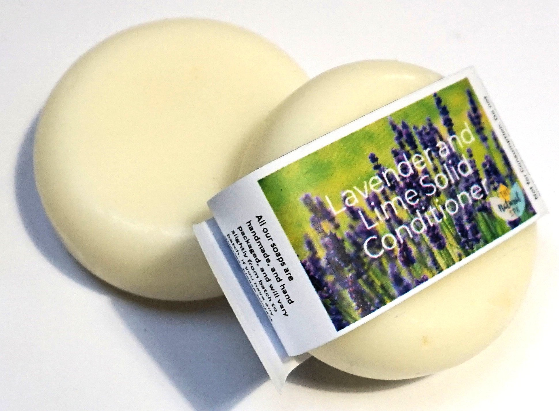 Lavender and Lime Solid Conditioner bar, eco-friendly and plastic-free, showcasing its unique design and natural ingredients.