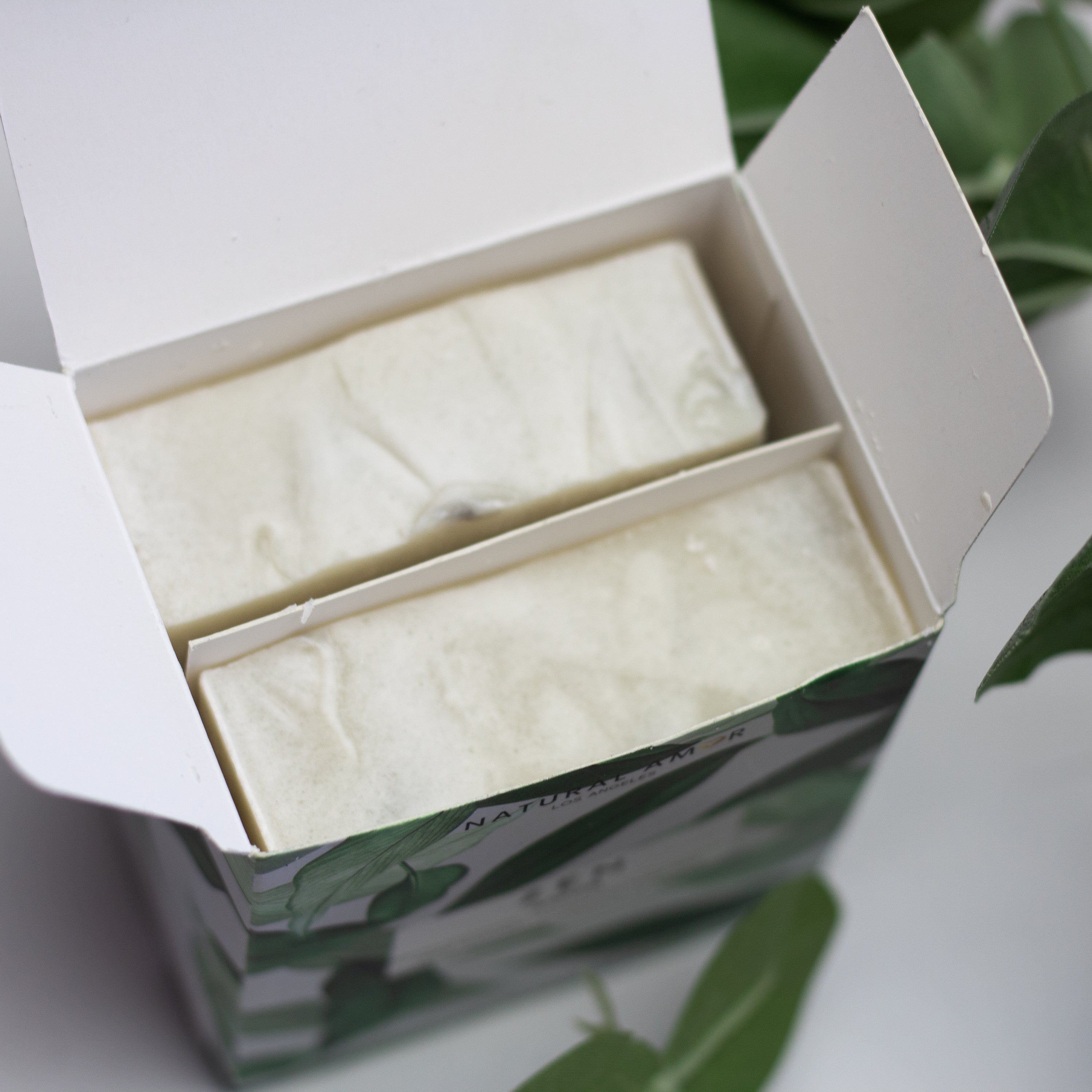 Lavender Cedar Zen Soap 2pk featuring two elegant soap bars with a calming lavender and cedar scent, beautifully packaged in a stylish box.