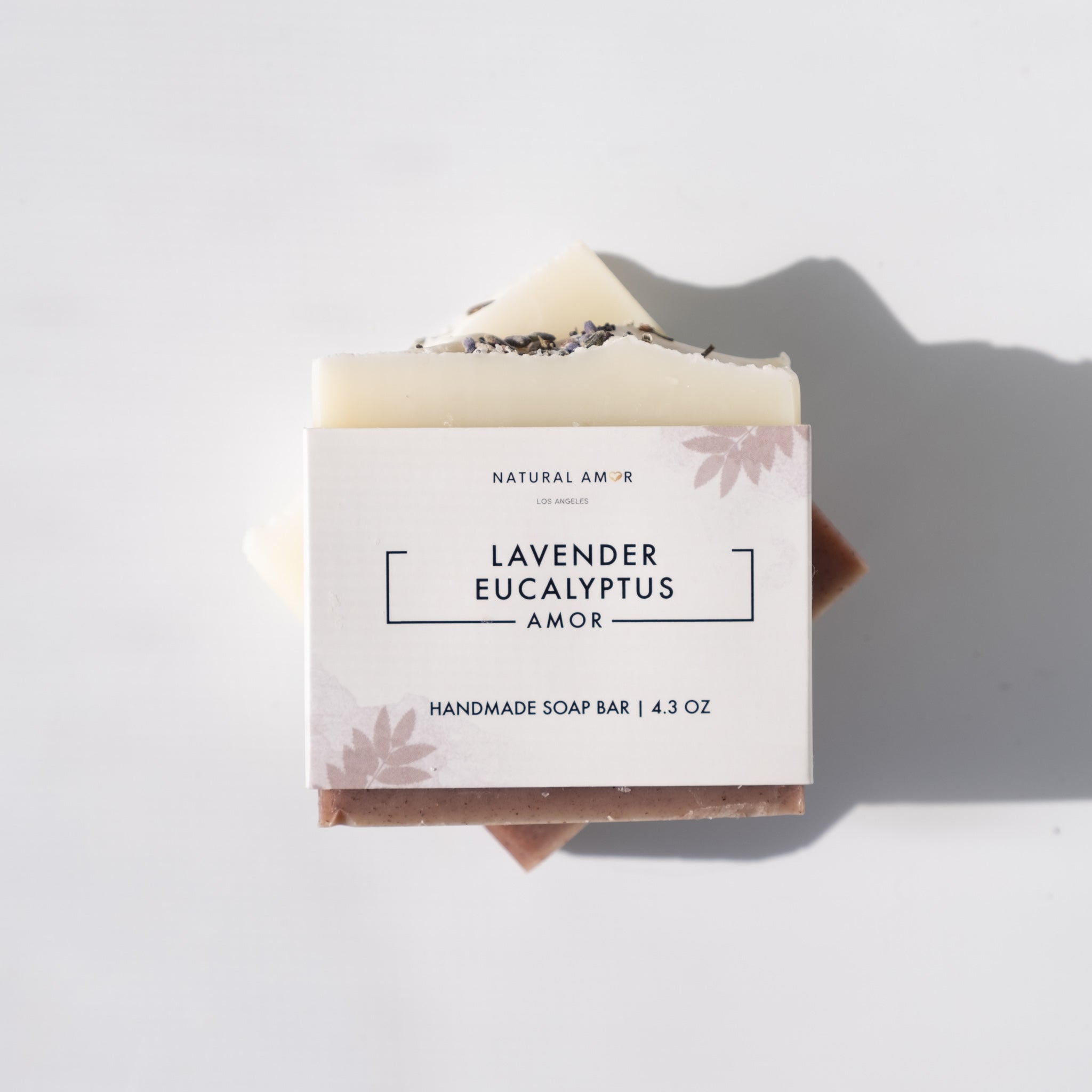 Lavender Eucalyptus Soap Bar with three colorful layers, showcasing natural ingredients and a calming lavender scent.