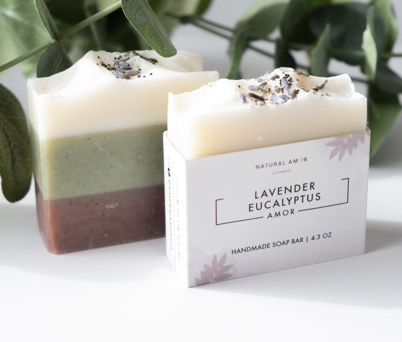 Lavender Eucalyptus Soap Bar with three colorful layers, showcasing natural ingredients and a calming lavender scent.