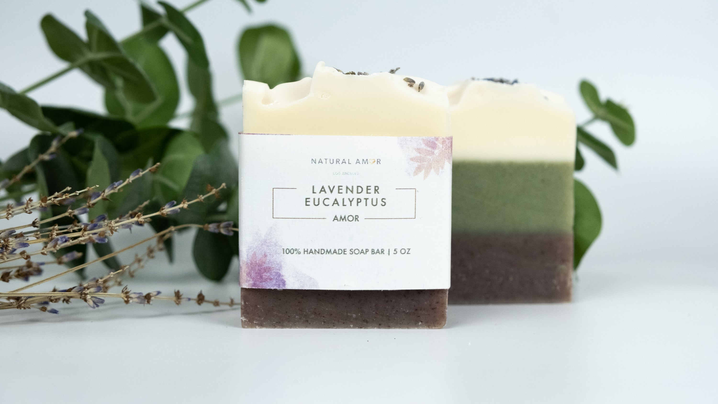 Lavender Eucalyptus Soap Bar with three colorful layers, showcasing natural ingredients and a calming lavender scent.