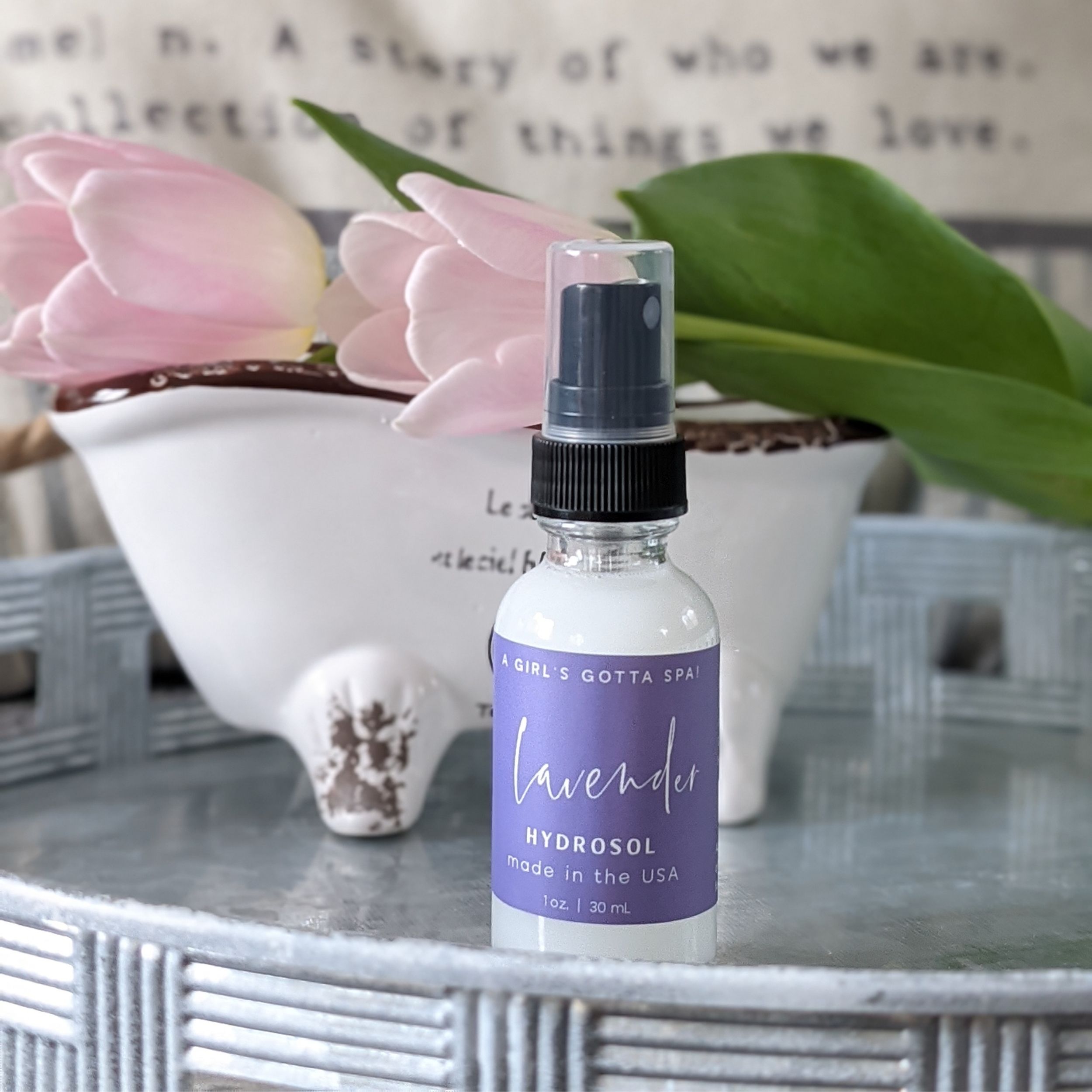 A bottle of Lavender Hydrosol Aromatherapy Pillow Spray with a calming lavender background, showcasing its natural ingredients.