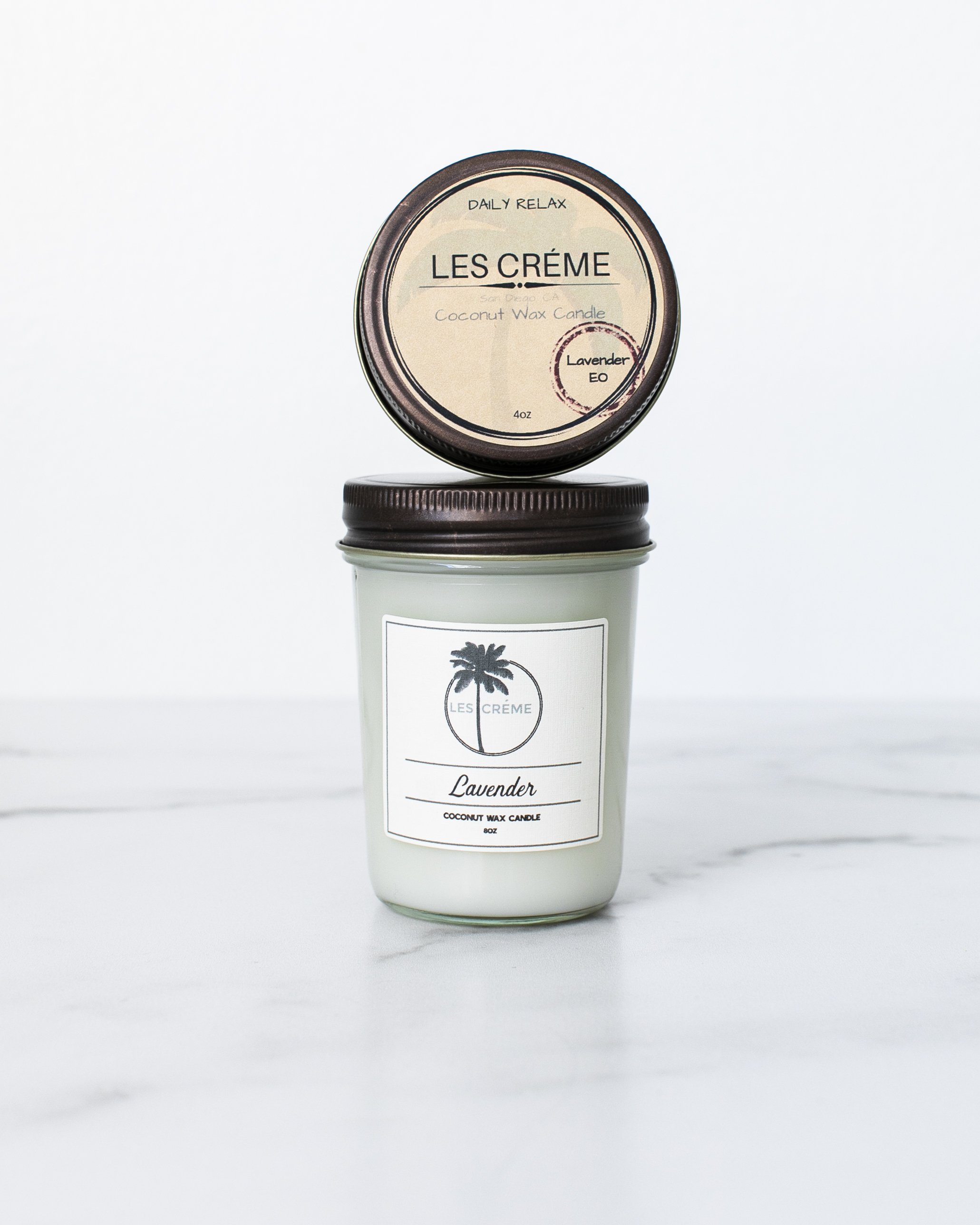 Lavender Scent Coconut Wax Candle in a glass jar, showcasing its natural ingredients and calming lavender color.