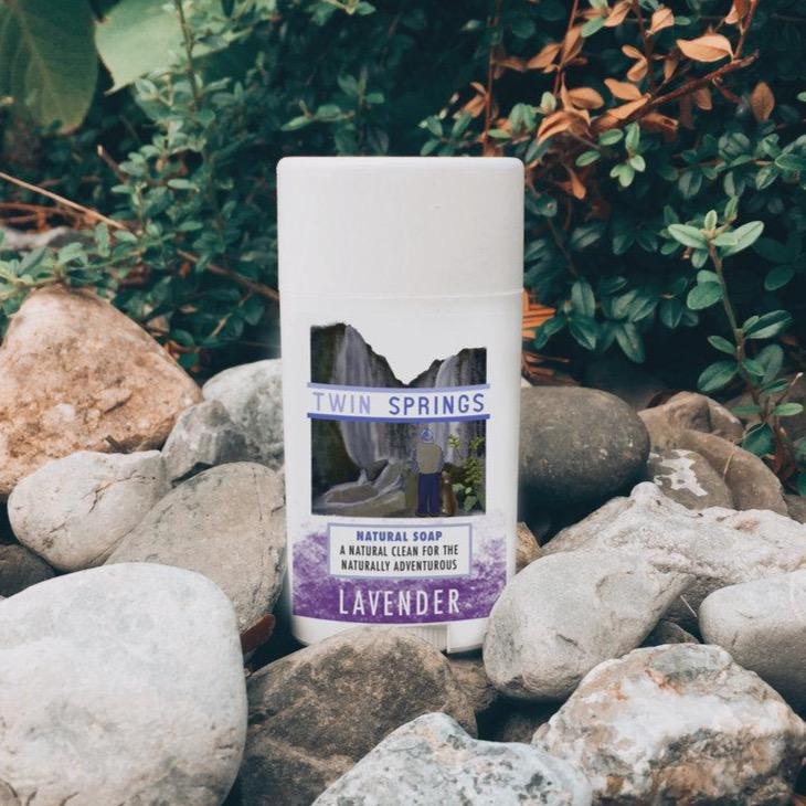 Twin Springs Lavender Soap Stick in a travel-friendly container, showcasing its handcrafted design and natural ingredients.