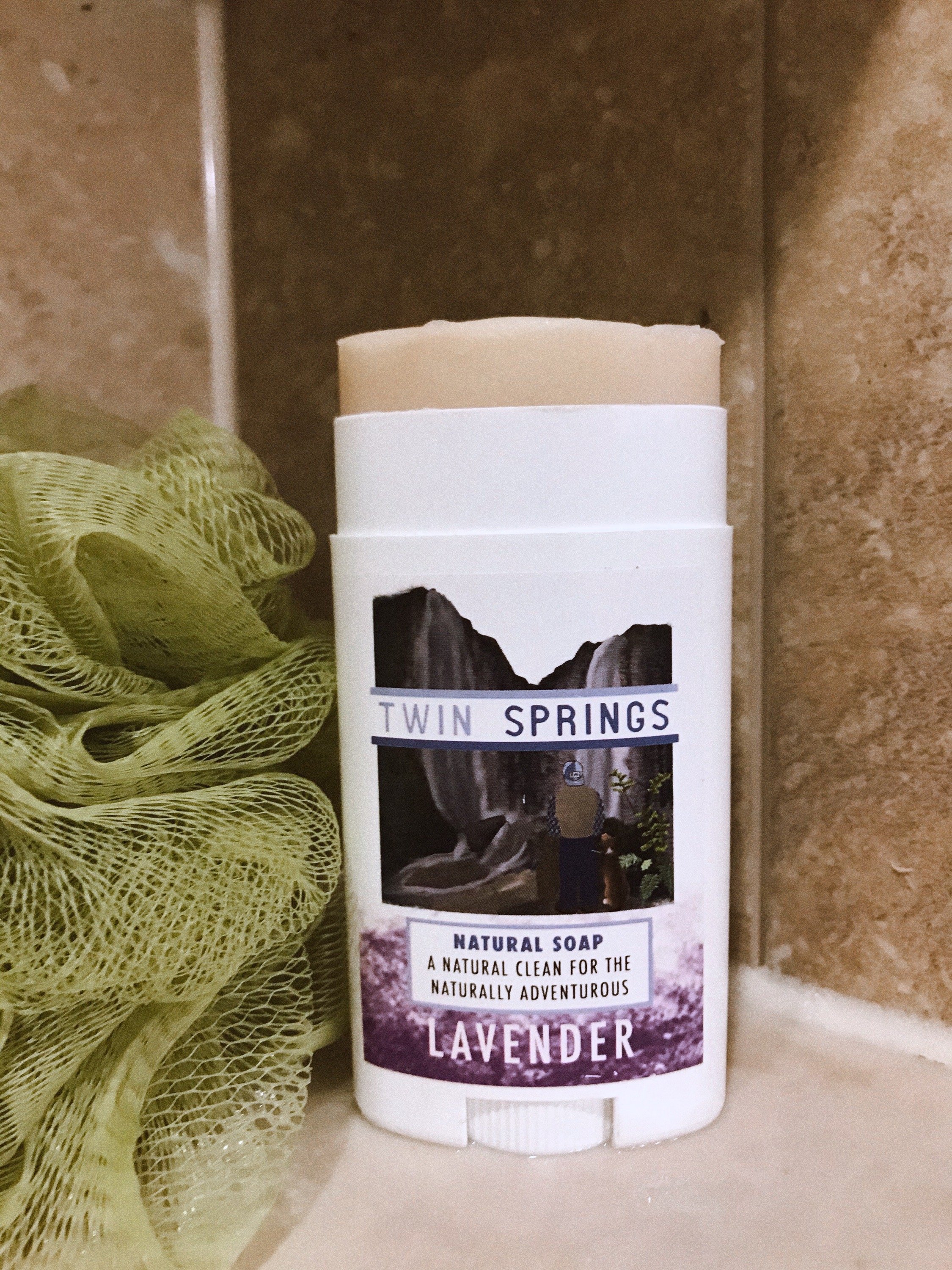 Twin Springs Lavender Soap Stick in a travel-friendly container, showcasing its handcrafted design and natural ingredients.