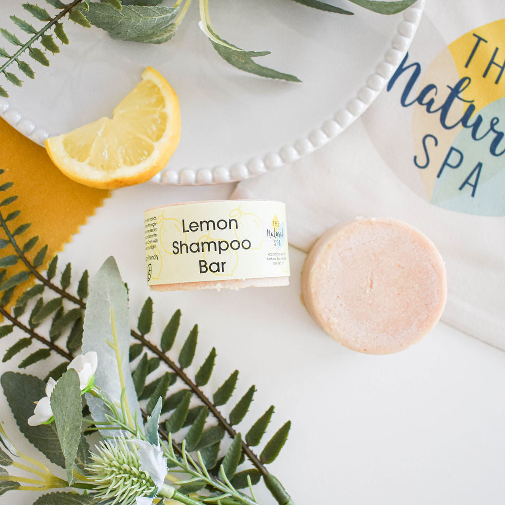 Lemon Shampoo Bar with vibrant yellow color, showcasing its unique handmade design and natural ingredients.