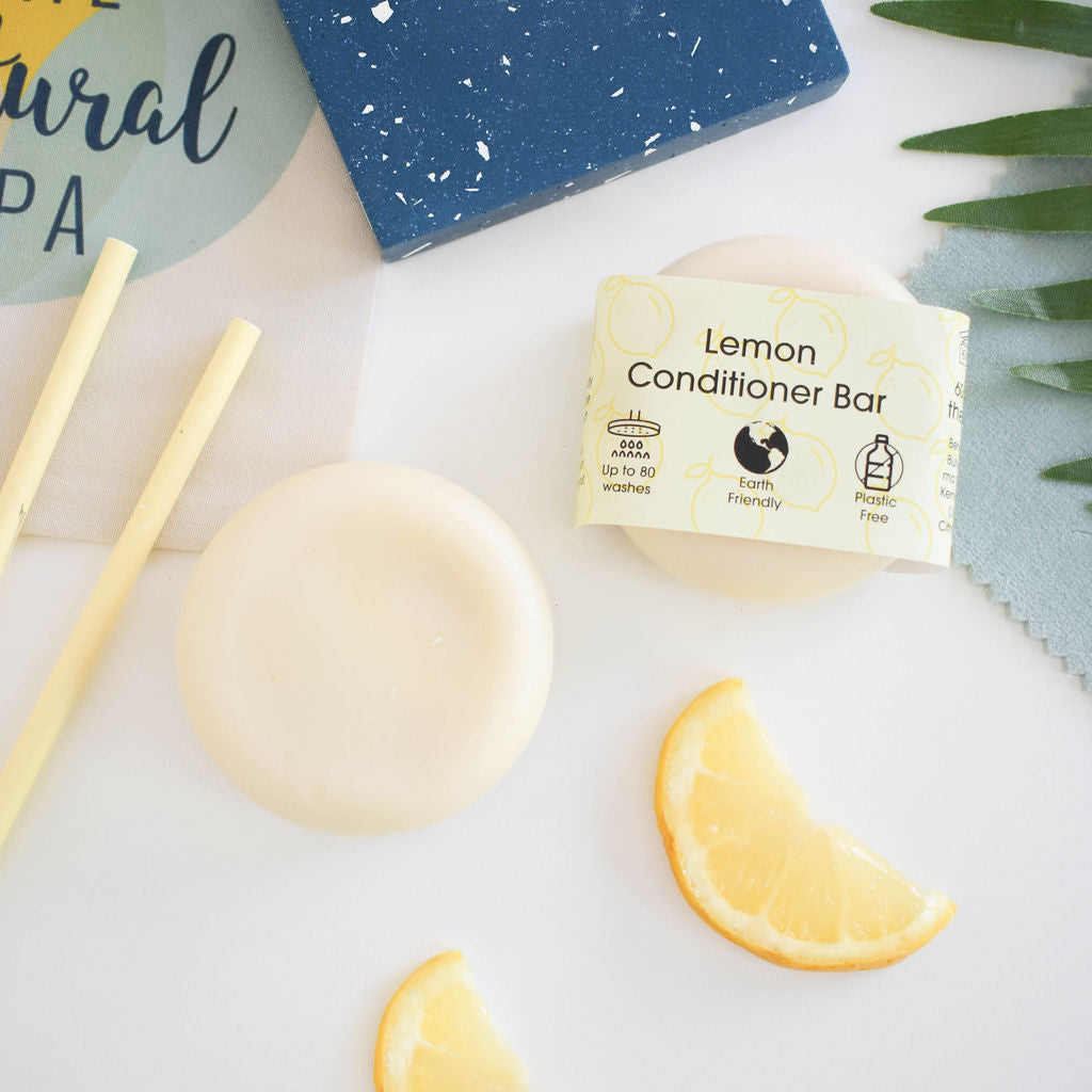 Lemon Solid Conditioner bar with a vibrant yellow color, showcasing its natural ingredients and eco-friendly packaging.