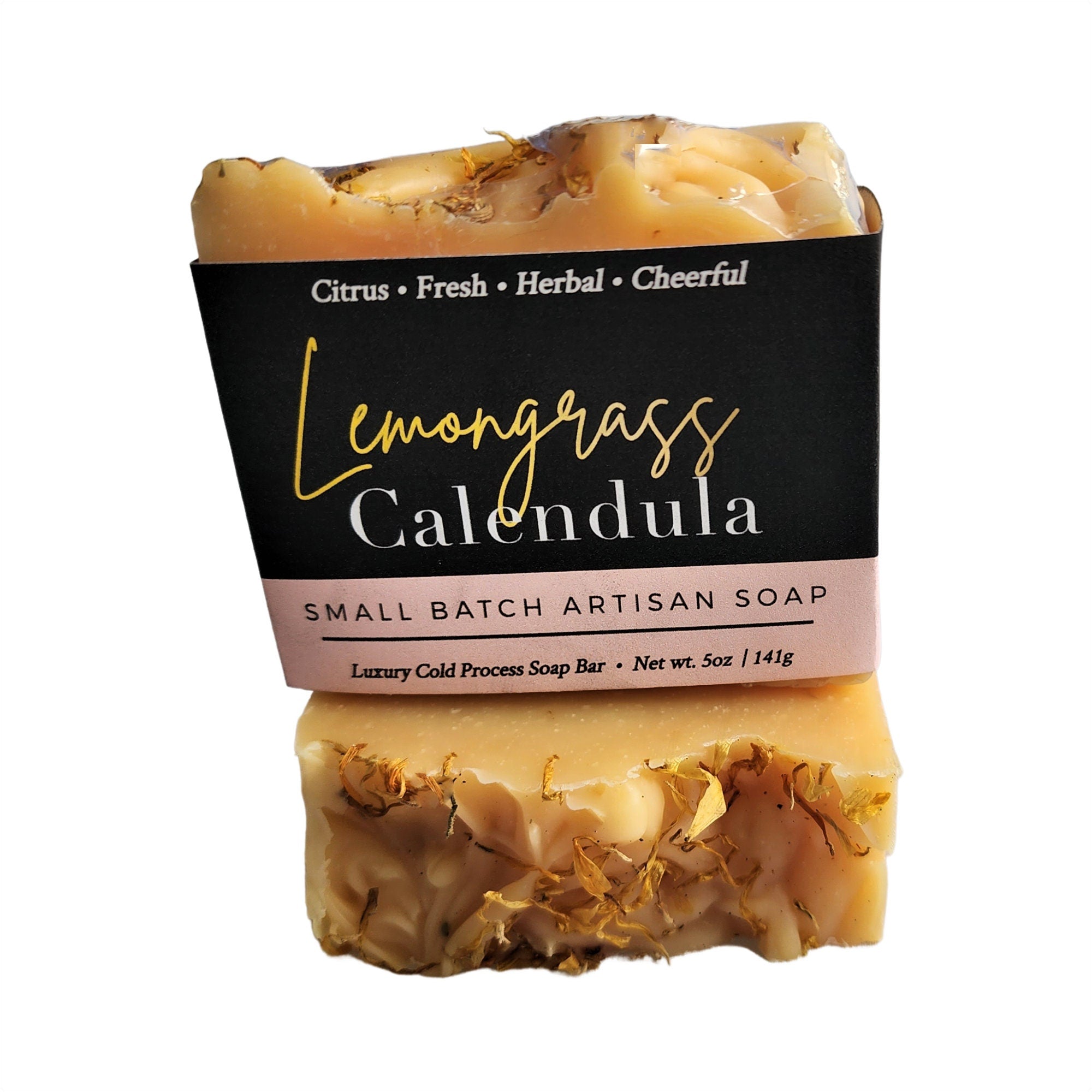 Lemongrass Calendula Soap bar topped with calendula petals, showcasing its vibrant colors and rich texture.