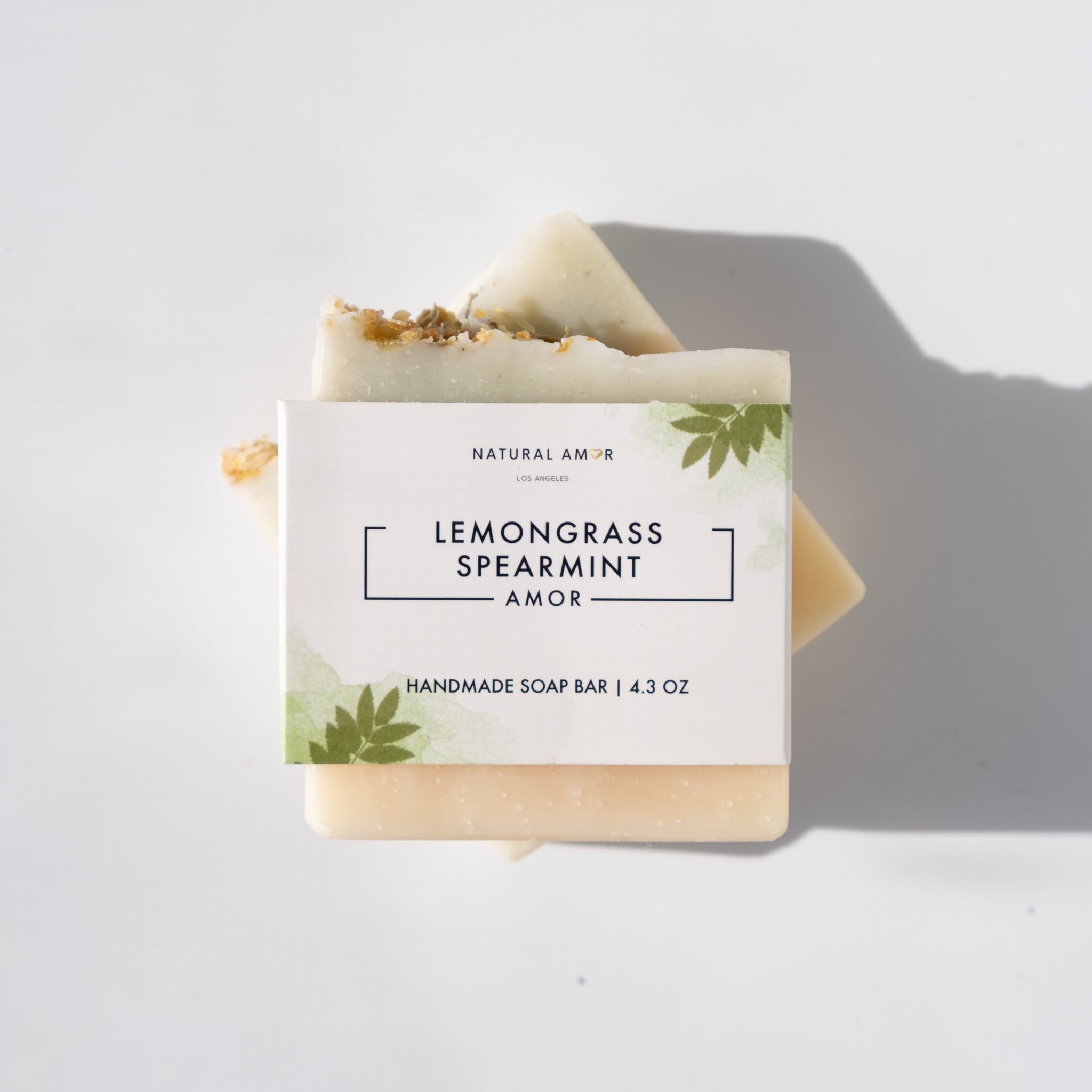 Lemongrass Spearmint Soap Bar with organic ingredients, showcasing its creamy texture and vibrant color.