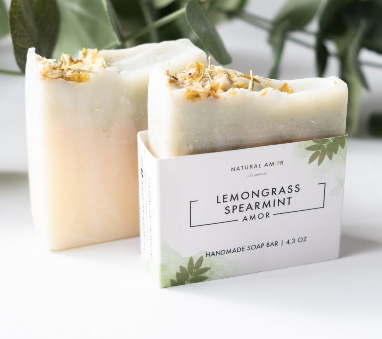 Lemongrass Spearmint Soap Bar with organic ingredients, showcasing its creamy texture and vibrant color.