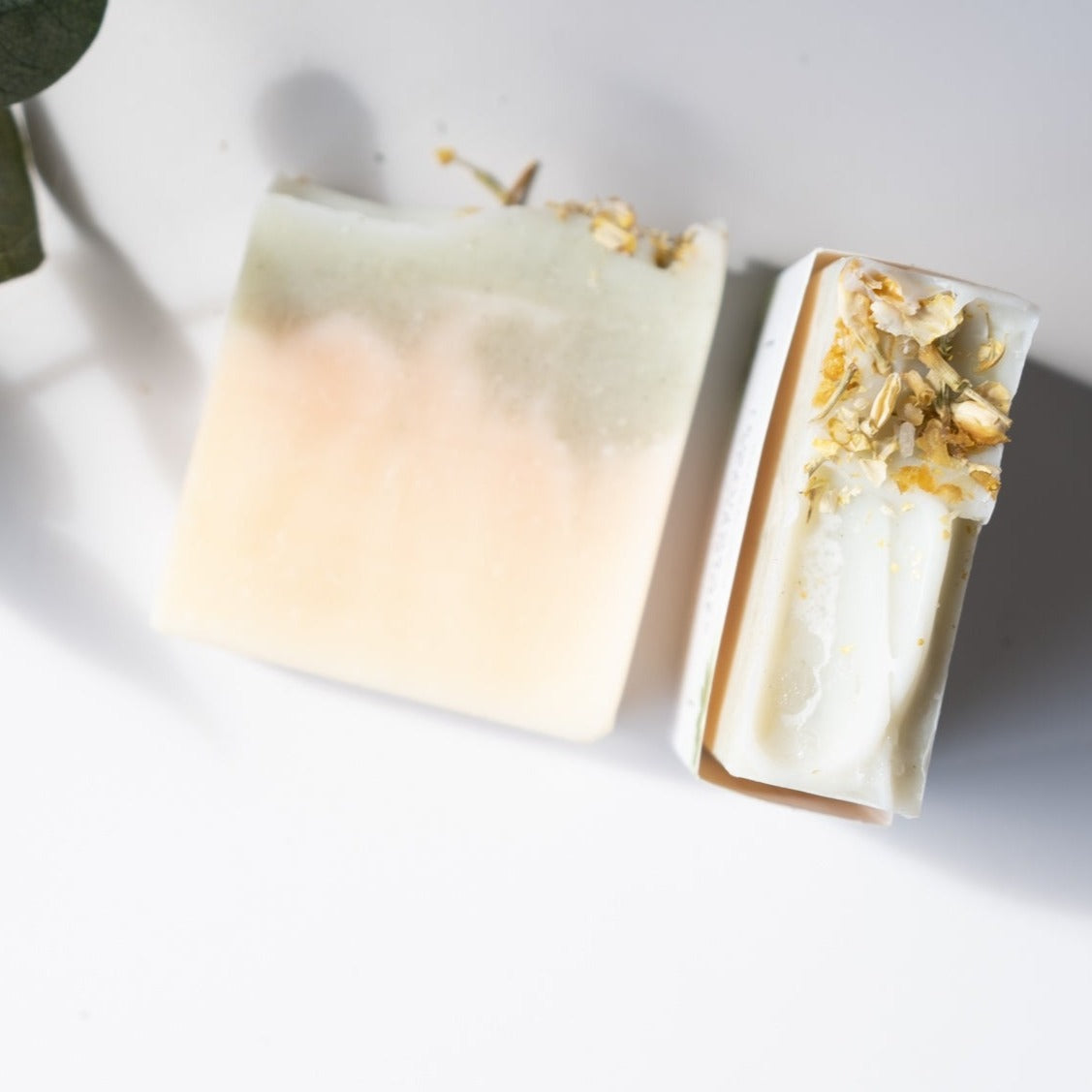 Lemongrass Spearmint Soap Bar with organic ingredients, showcasing its creamy texture and vibrant color.