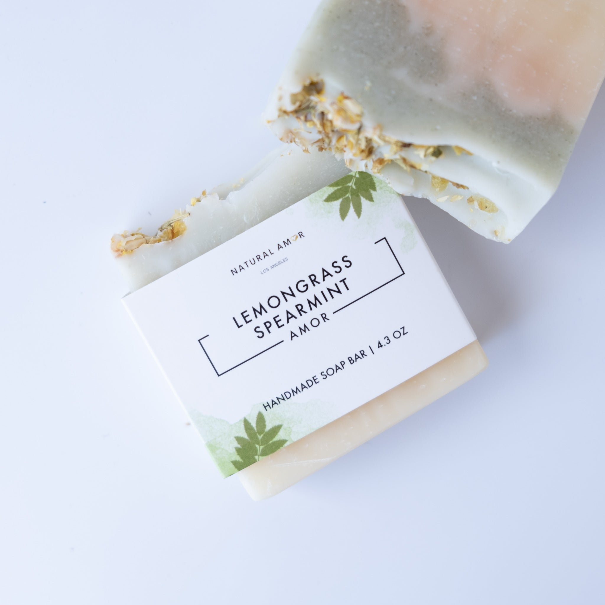 Lemongrass Spearmint Soap Bar with organic ingredients, showcasing its creamy texture and vibrant color.