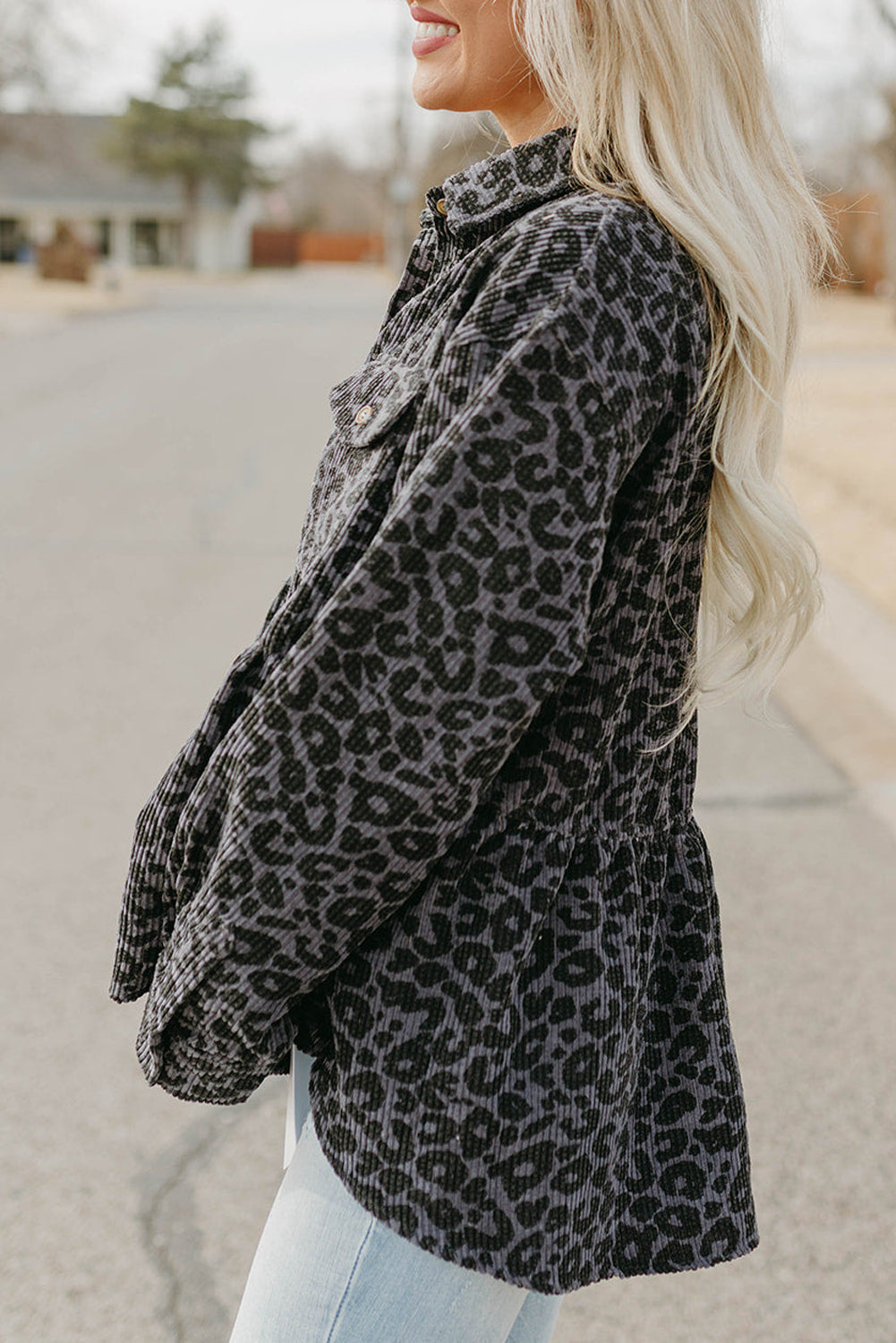 Leopard Corduroy Ruffled Shacket featuring a stylish leopard print, ruffled details, and flap pockets, perfect for modern women's fashion.