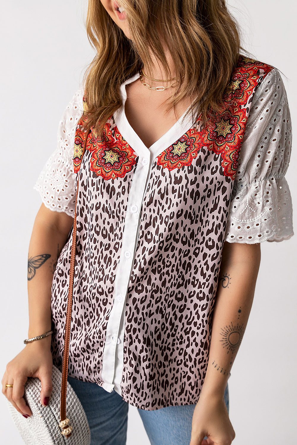 Leopard Mandala Hollow-out Sleeves T-shirt featuring floral pattern sleeves and a relaxed fit, perfect for bohemian style lovers.