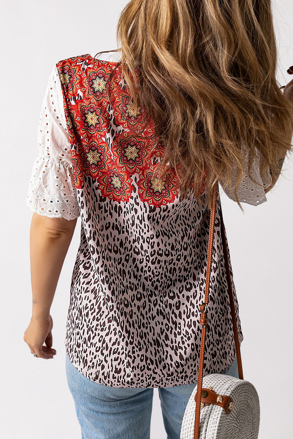 Leopard Mandala Hollow-out Sleeves T-shirt featuring floral pattern sleeves and a relaxed fit, perfect for bohemian style lovers.