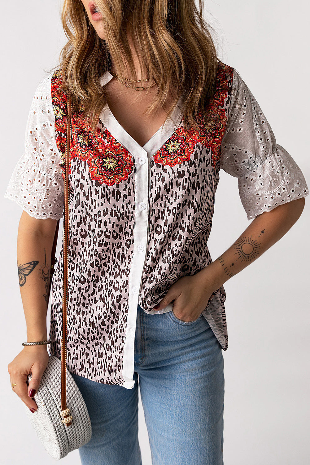 Leopard Mandala Hollow-out Sleeves T-shirt featuring floral pattern sleeves and a relaxed fit, perfect for bohemian style lovers.