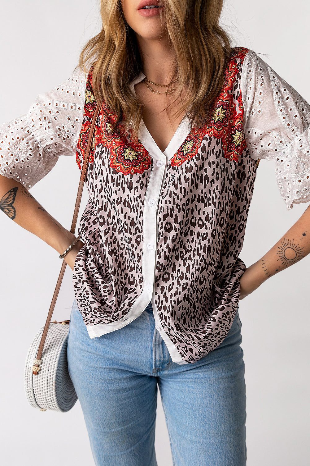 Leopard Mandala Hollow-out Sleeves T-shirt featuring floral pattern sleeves and a relaxed fit, perfect for bohemian style lovers.