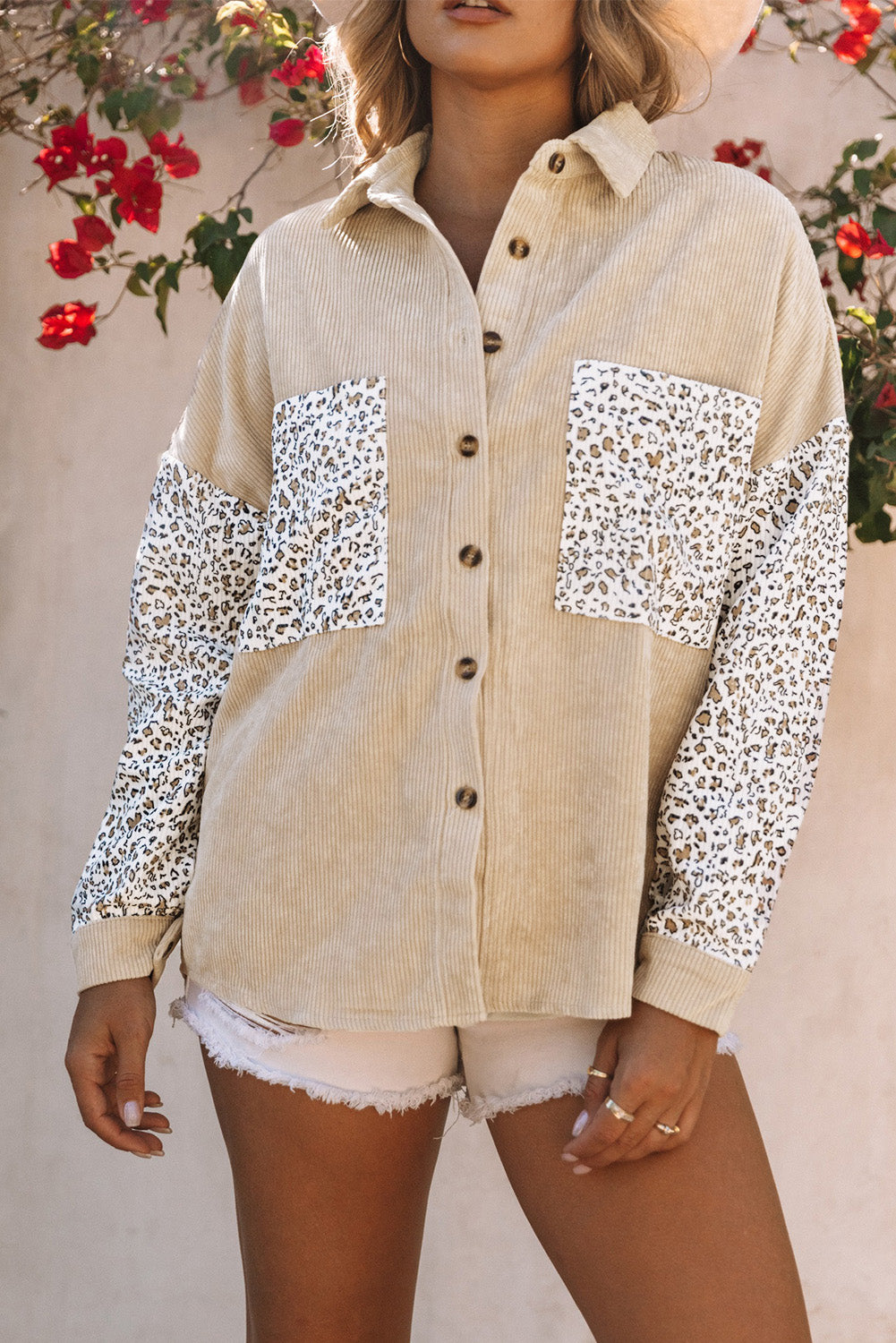 Leopard Patchwork Corduroy Buttoned Shirt Jacket featuring a stylish design with a turn-down collar and high-low hemline.