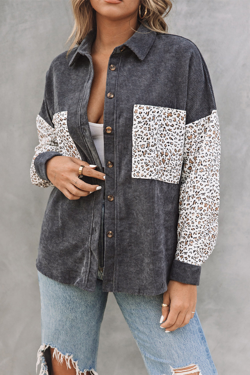 Leopard Patchwork Corduroy Buttoned Shirt Jacket featuring a stylish design with a turn-down collar and high-low hemline.