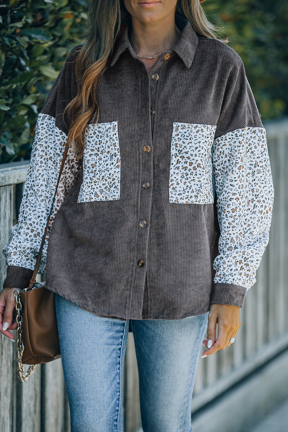 Leopard Patchwork Corduroy Buttoned Shirt Jacket featuring a stylish design with a turn-down collar and high-low hemline.