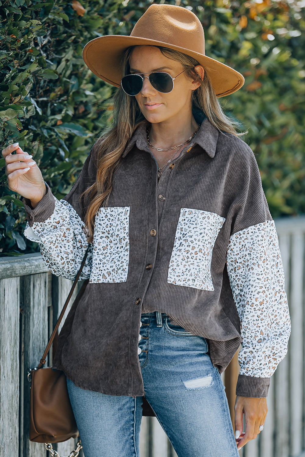 Leopard Patchwork Corduroy Buttoned Shirt Jacket featuring a stylish design with a turn-down collar and high-low hemline.