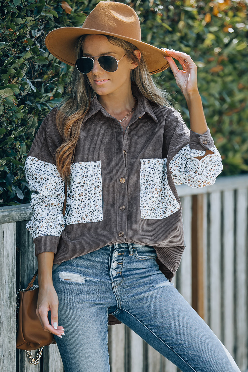 Leopard Patchwork Corduroy Buttoned Shirt Jacket featuring a stylish design with a turn-down collar and high-low hemline.