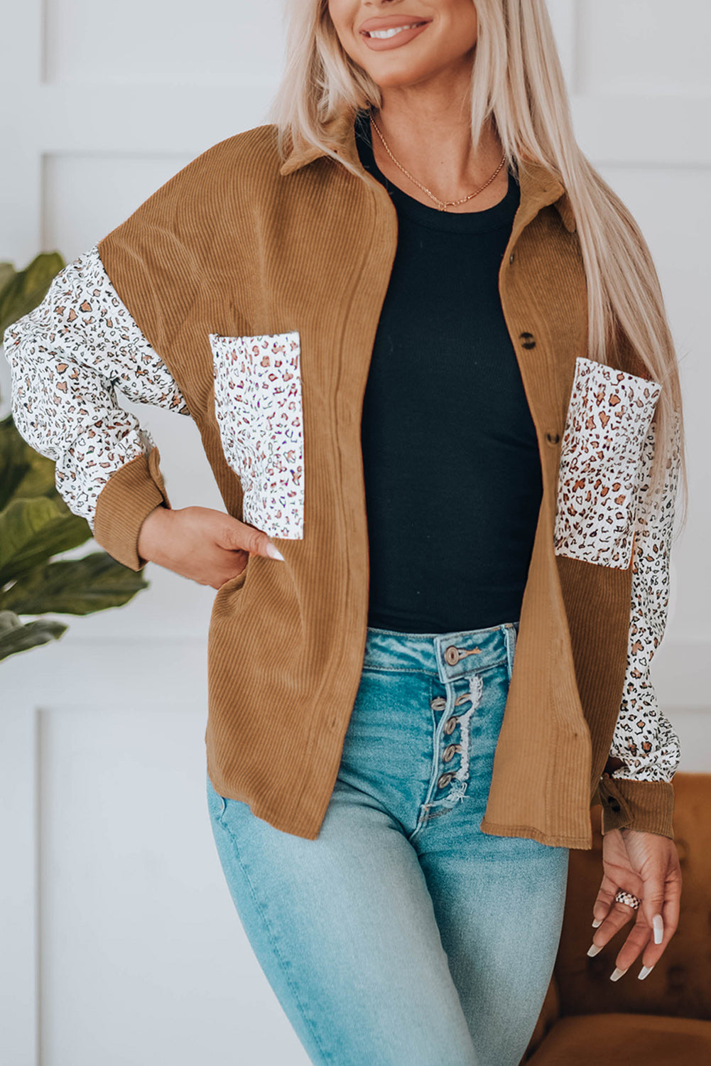 Leopard Patchwork Corduroy Buttoned Shirt Jacket featuring a stylish design with a turn-down collar and high-low hemline.