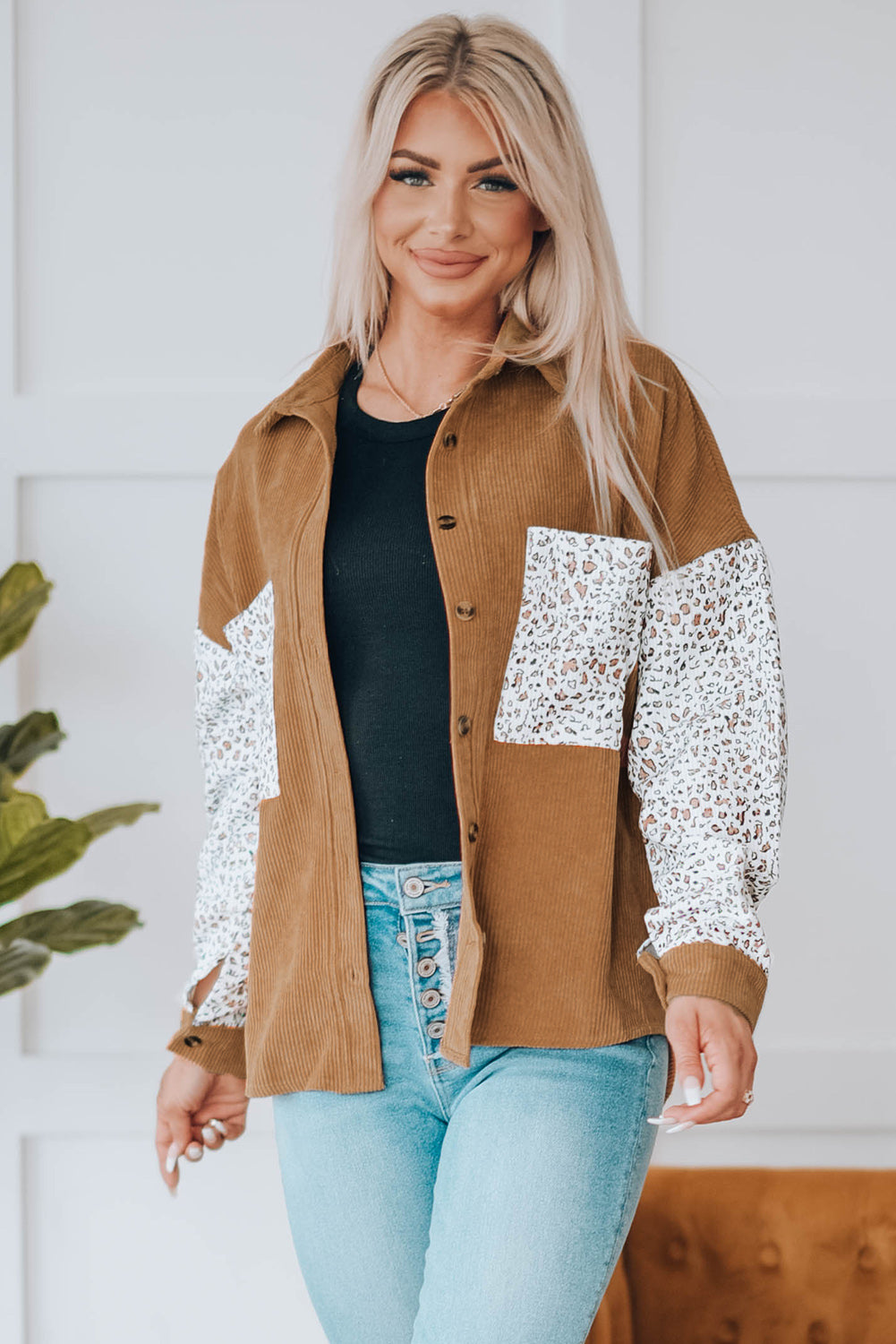 Leopard Patchwork Corduroy Buttoned Shirt Jacket featuring a stylish design with a turn-down collar and high-low hemline.