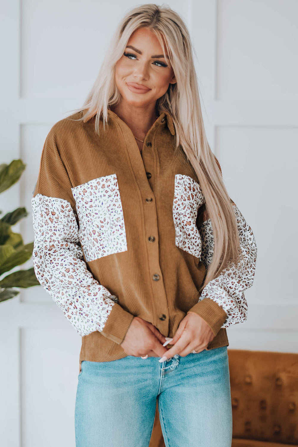 Leopard Patchwork Corduroy Buttoned Shirt Jacket featuring a stylish design with a turn-down collar and high-low hemline.