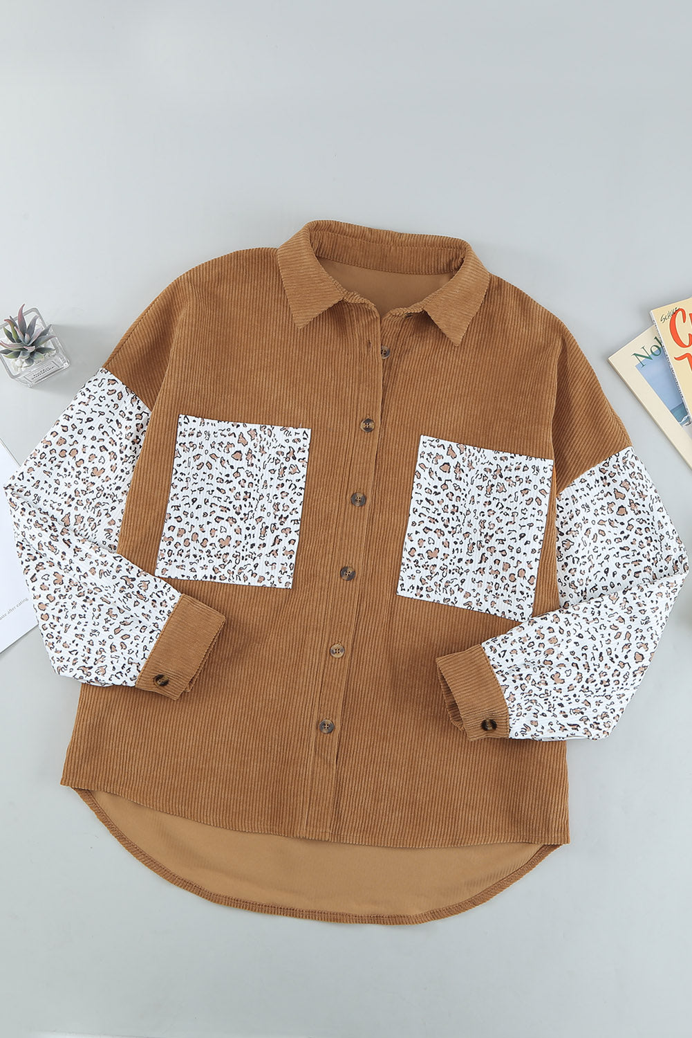 Leopard Patchwork Corduroy Buttoned Shirt Jacket featuring a stylish design with a turn-down collar and high-low hemline.