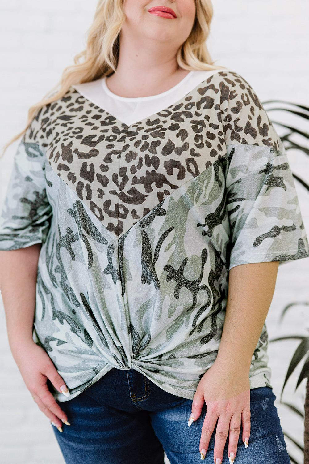 Leopard Plus Size T-Shirt featuring camo splicing and twist knot design, perfect for casual and trendy outfits.