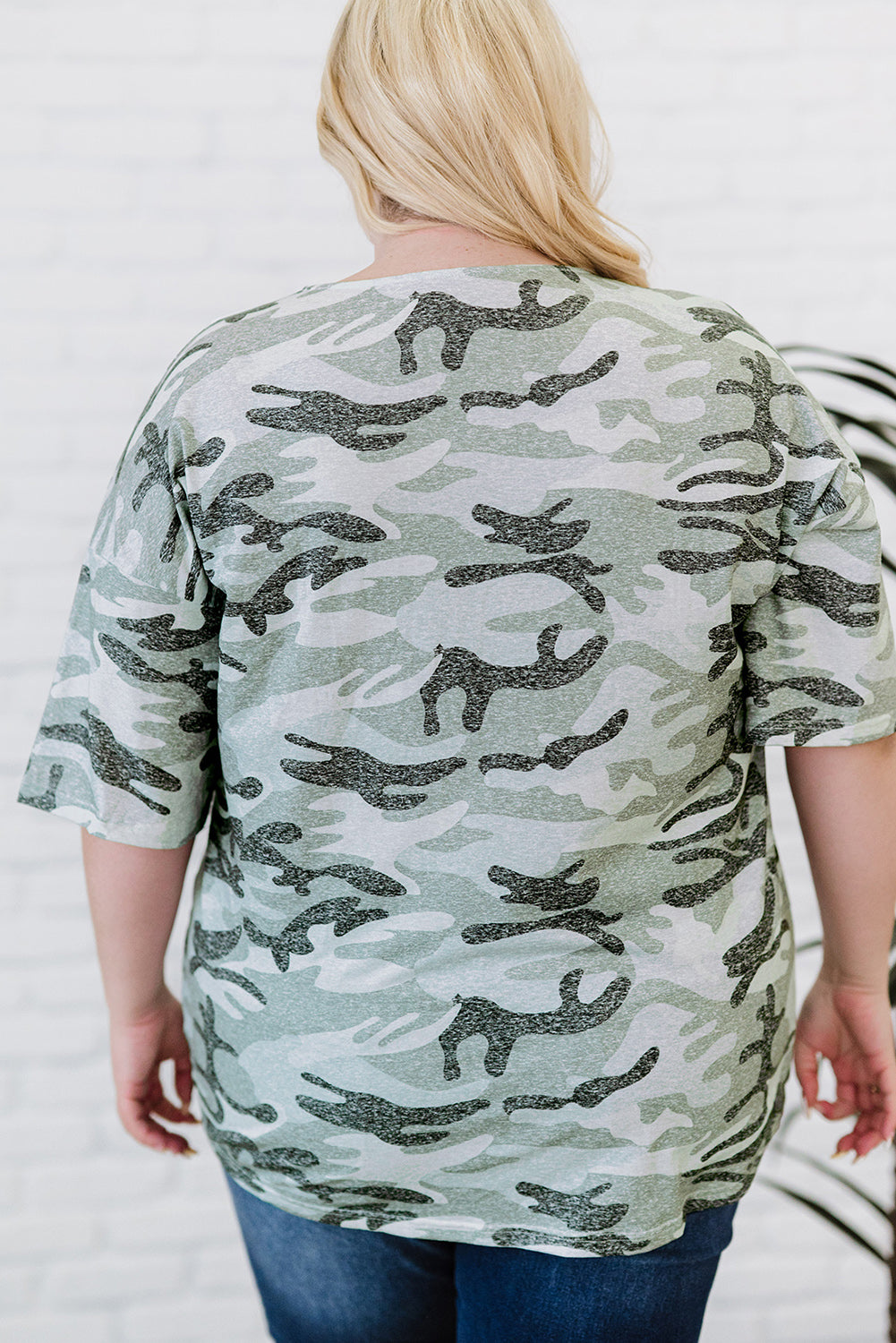 Leopard Plus Size T-Shirt featuring camo splicing and twist knot design, perfect for casual and trendy outfits.