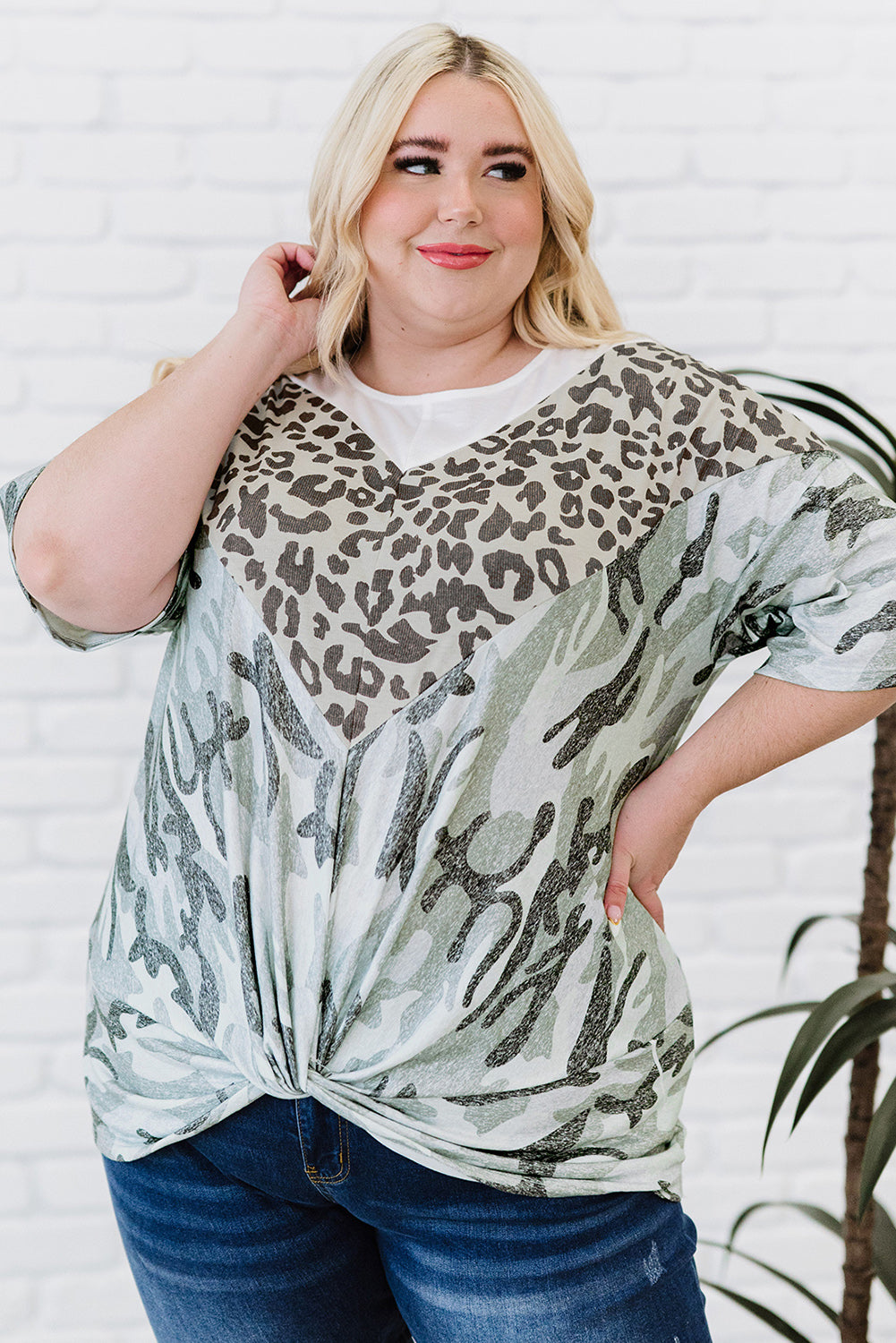 Leopard Plus Size T-Shirt featuring camo splicing and twist knot design, perfect for casual and trendy outfits.