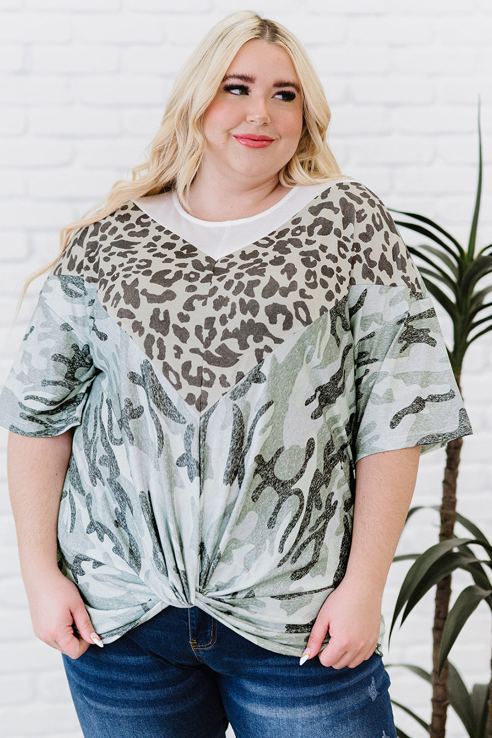 Leopard Plus Size T-Shirt featuring camo splicing and twist knot design, perfect for casual and trendy outfits.