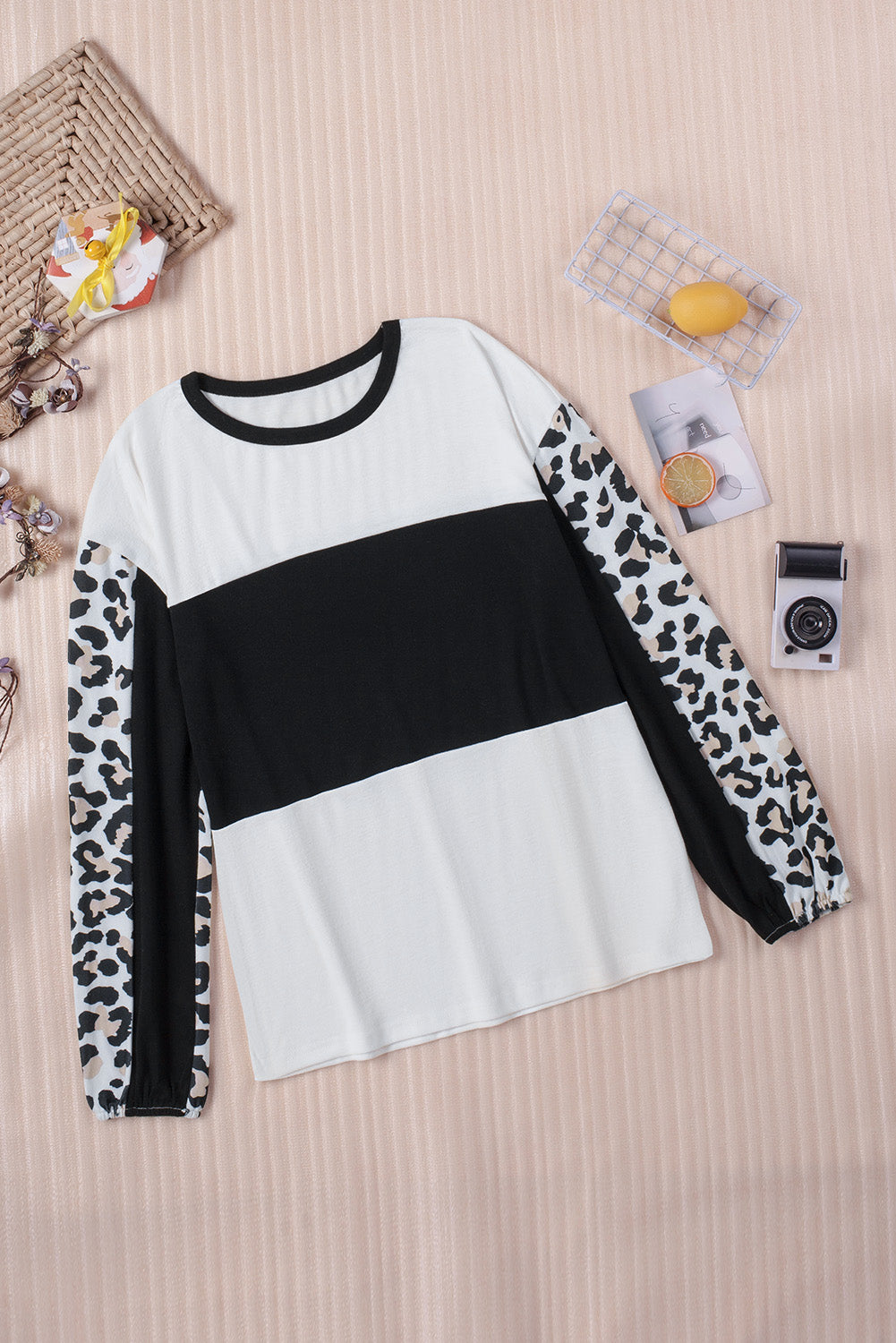 Leopard Print Colorblock Long Sleeve Top featuring a stylish design with a crew neck and long sleeves, perfect for casual wear.