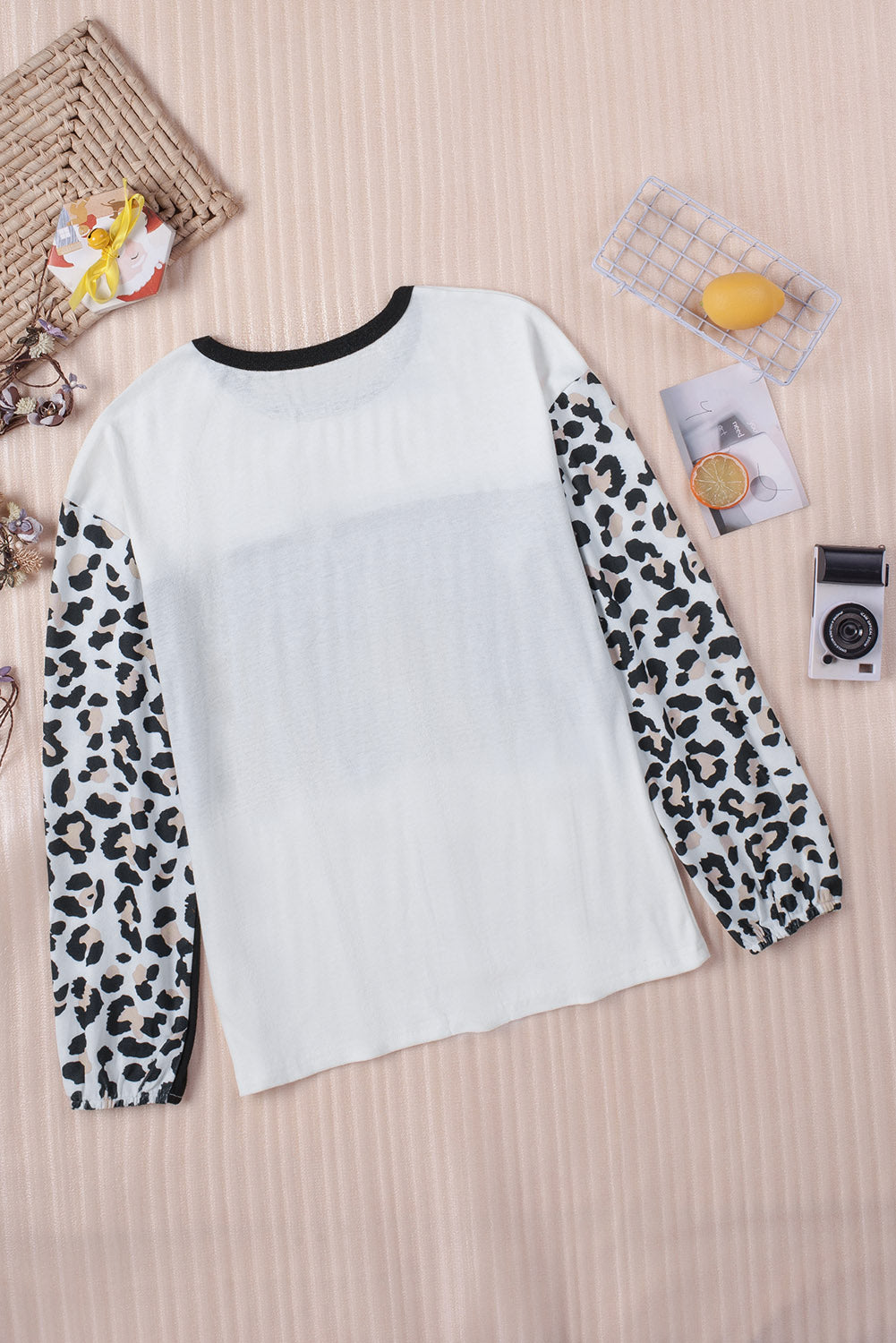 Leopard Print Colorblock Long Sleeve Top featuring a stylish design with a crew neck and long sleeves, perfect for casual wear.