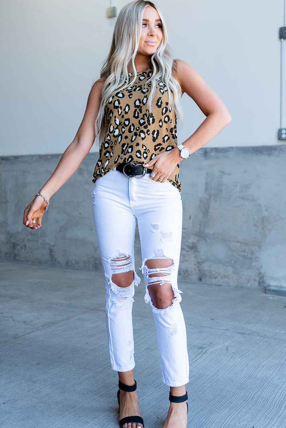 Leopard Print Crew Neck Tank Top displayed on a mannequin, showcasing its bold pattern and sleeveless design.