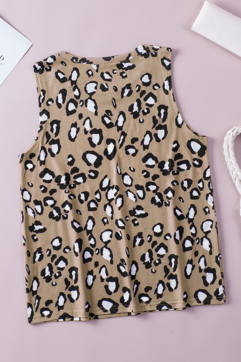 Leopard Print Crew Neck Tank Top displayed on a mannequin, showcasing its bold pattern and sleeveless design.