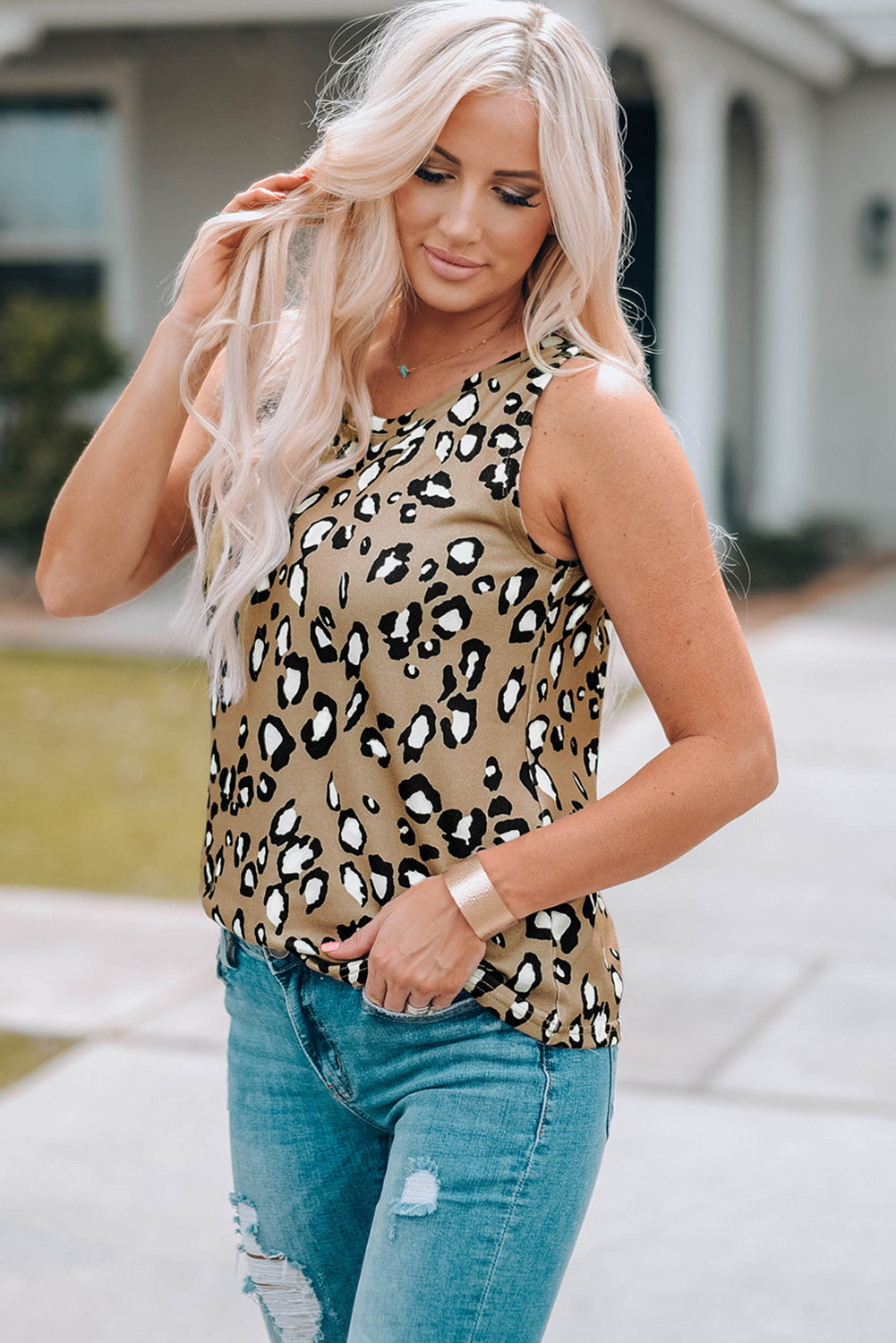 Leopard Print Crew Neck Tank Top displayed on a mannequin, showcasing its bold pattern and sleeveless design.