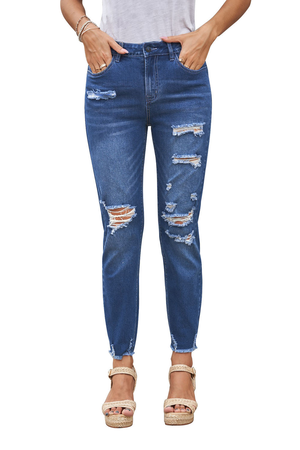 Light blue distressed boyfriend denim pants with a medium rise fit and straight leg silhouette, featuring classic five-pocket styling.