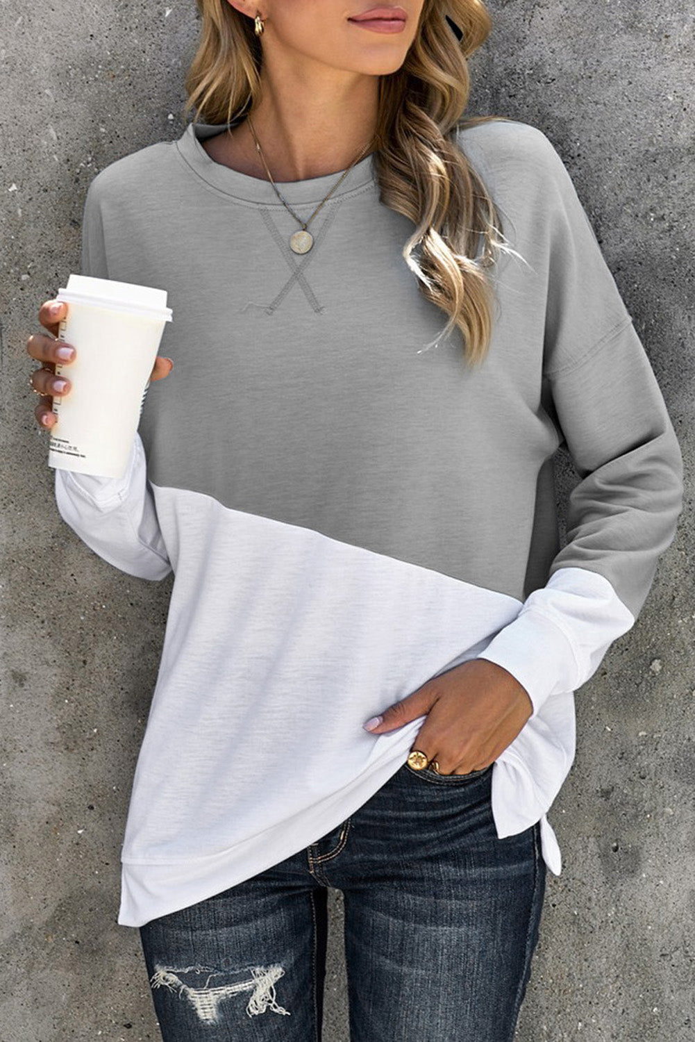 Light Blue Patchwork Dropped Shoulder Sweatshirt with color block design, showcasing a relaxed fit and soft fabric texture.