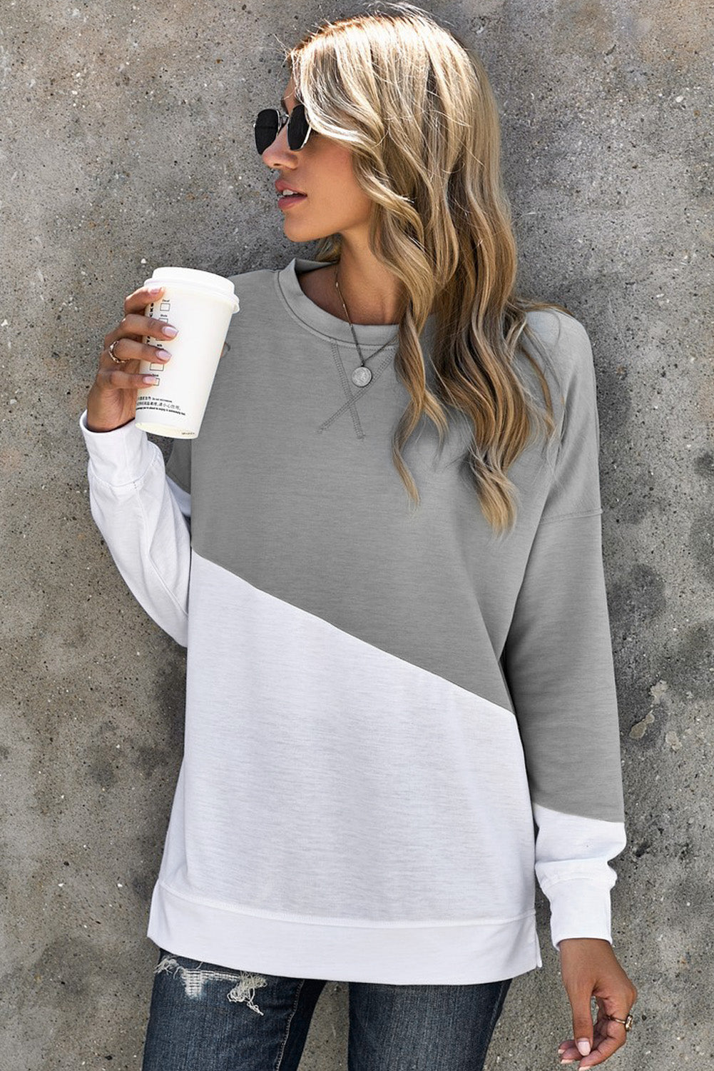 Light Blue Patchwork Dropped Shoulder Sweatshirt with color block design, showcasing a relaxed fit and soft fabric texture.