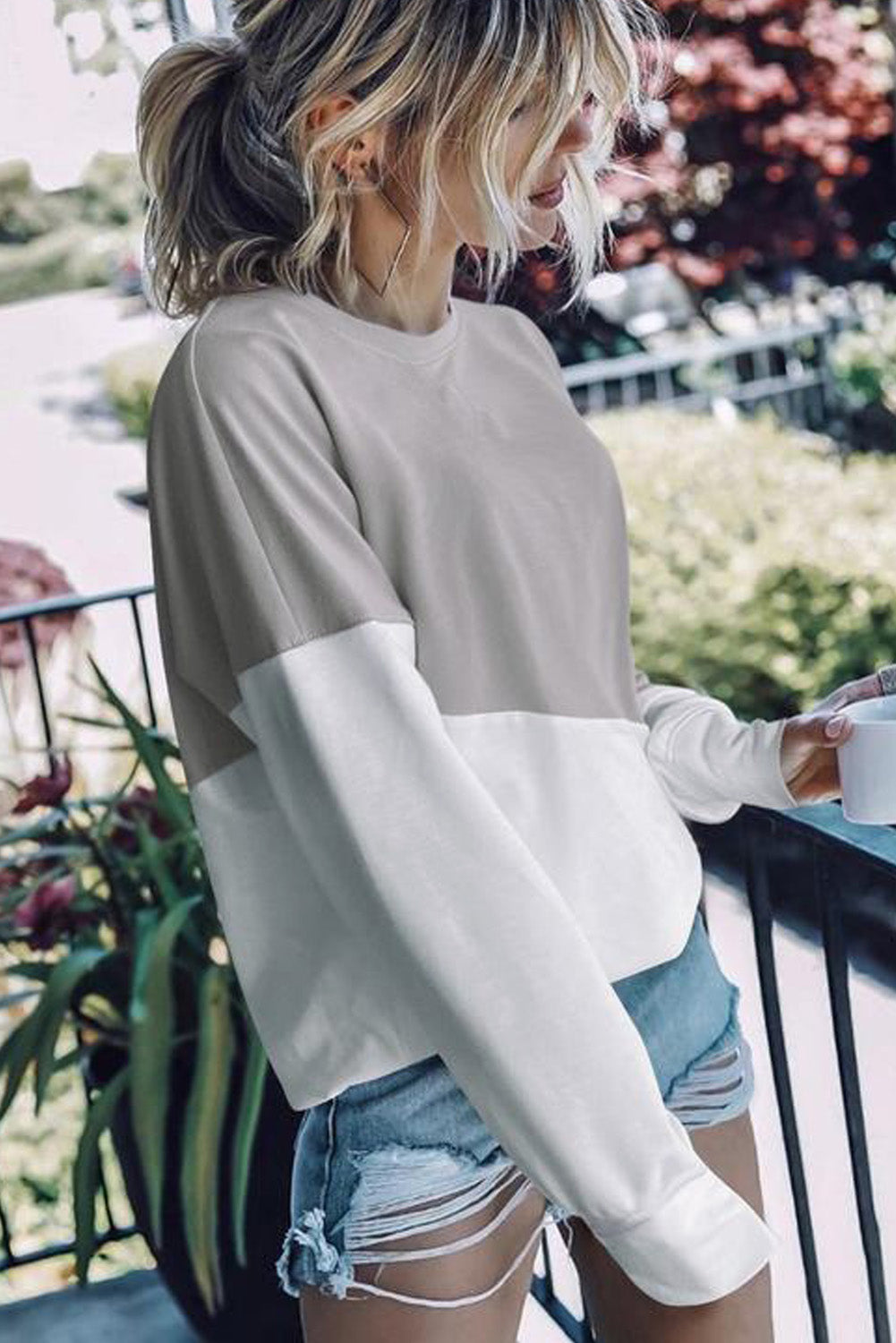 Light Blue Patchwork Dropped Shoulder Sweatshirt with color block design, showcasing a relaxed fit and soft fabric texture.